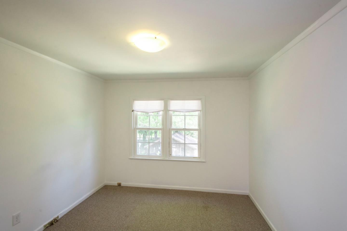 1556 Albemarle Way Burlingame, CA 94010 - Photo 13 of 18 an empty room with a window