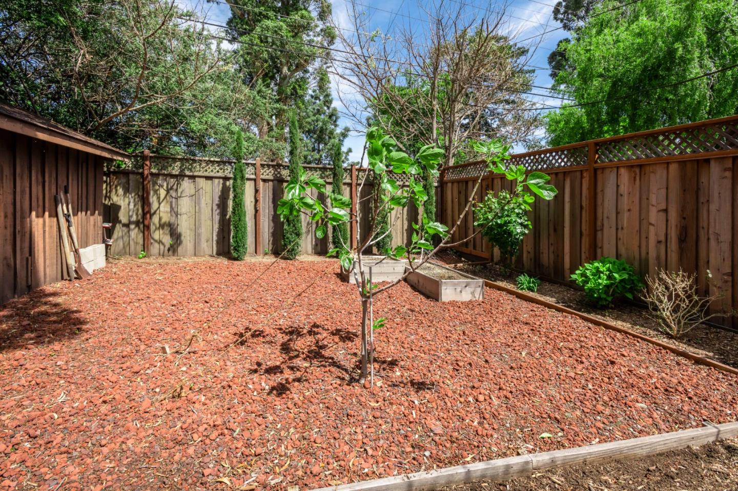 1556 Albemarle Way Burlingame, CA 94010 - Photo 17 of 18 a backyard of a house with lots of green space
