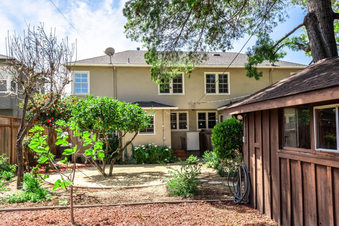 1556 Albemarle Way Burlingame, CA 94010 - Photo 18 of 18 a front view of a house with garden