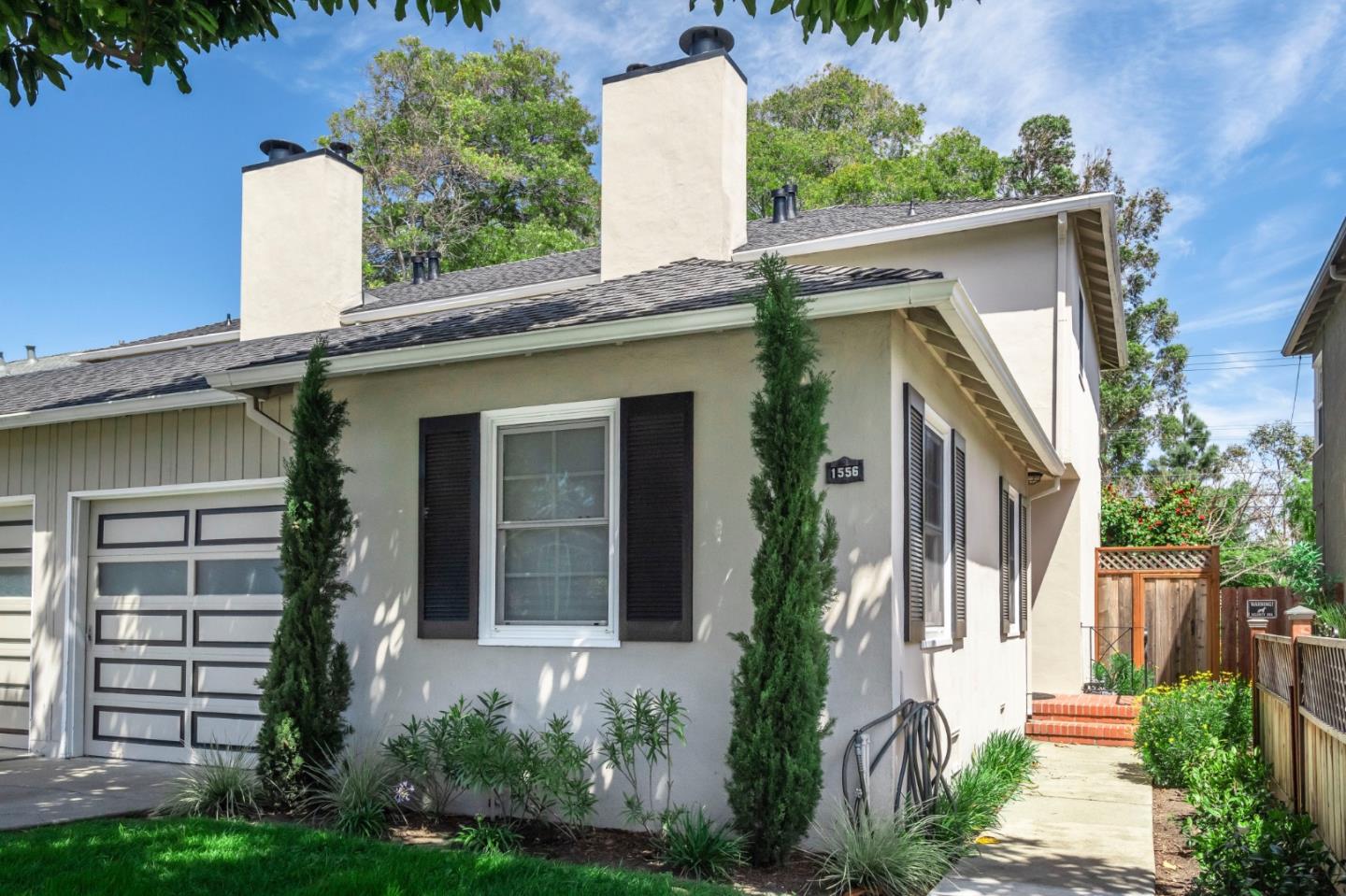 1556 Albemarle Way Burlingame, CA 94010 - Photo 2 of 18 front view of a house with a yard
