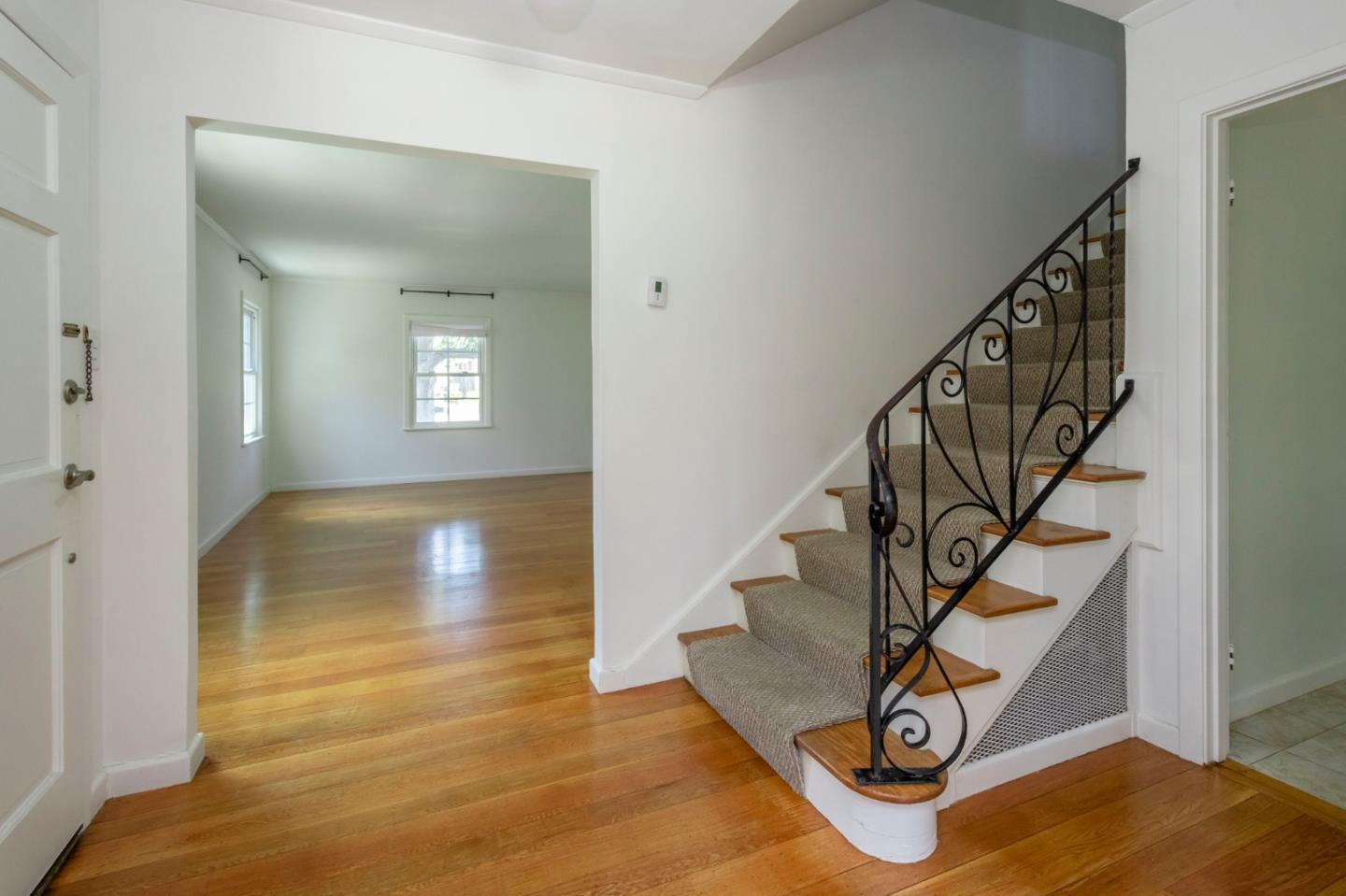 1556 Albemarle Way Burlingame, CA 94010 - Photo 6 of 18 a view of entryway and hall with wooden floor