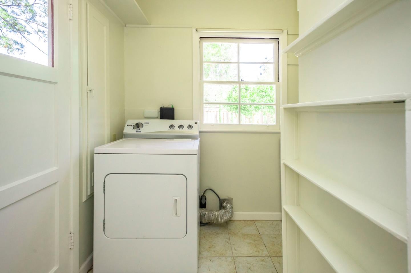 1556 Albemarle Way Burlingame, CA 94010 - Photo 9 of 18 a utility room with dryer and washer