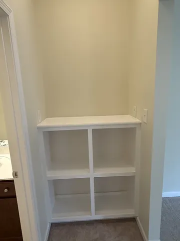 a view of a chandelier in big room