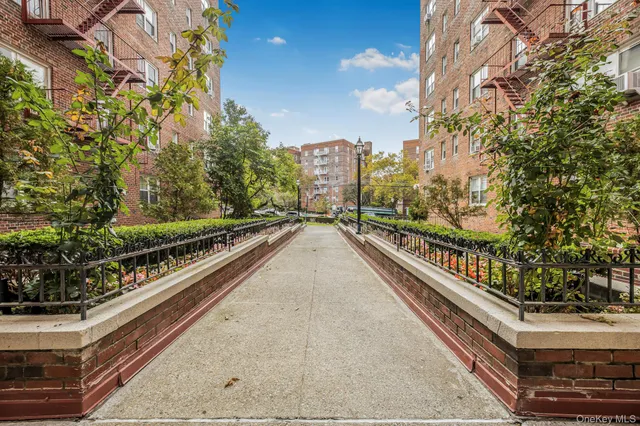 a view of a balcony with trees