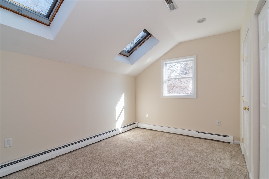 57 Wethersfield Road Natick, MA 01760 - Photo 20 of 28 an empty room with windows