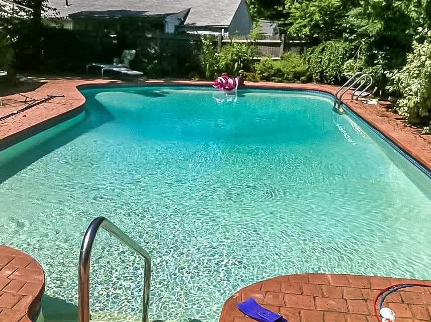57 Wethersfield Road Natick, MA 01760 - Photo 28 of 28 a view of swimming pool with a garden and deck