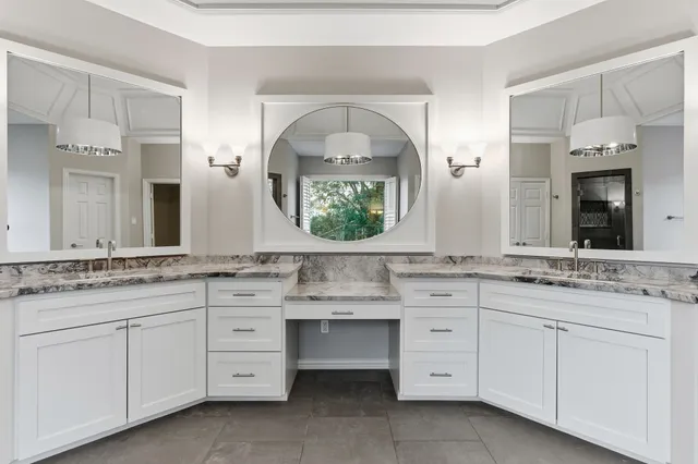 a view of an empty room with a kitchen