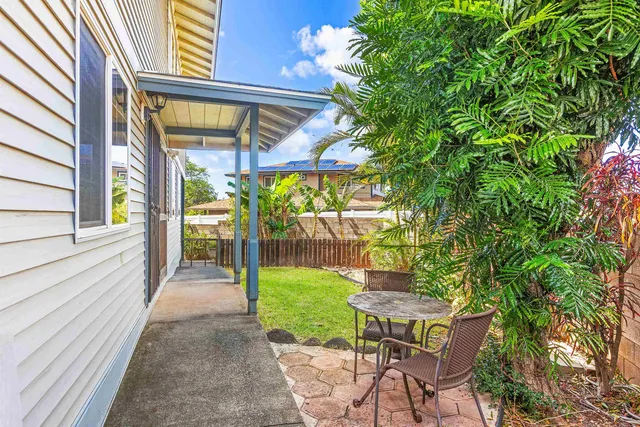 a view of yard with seating area
