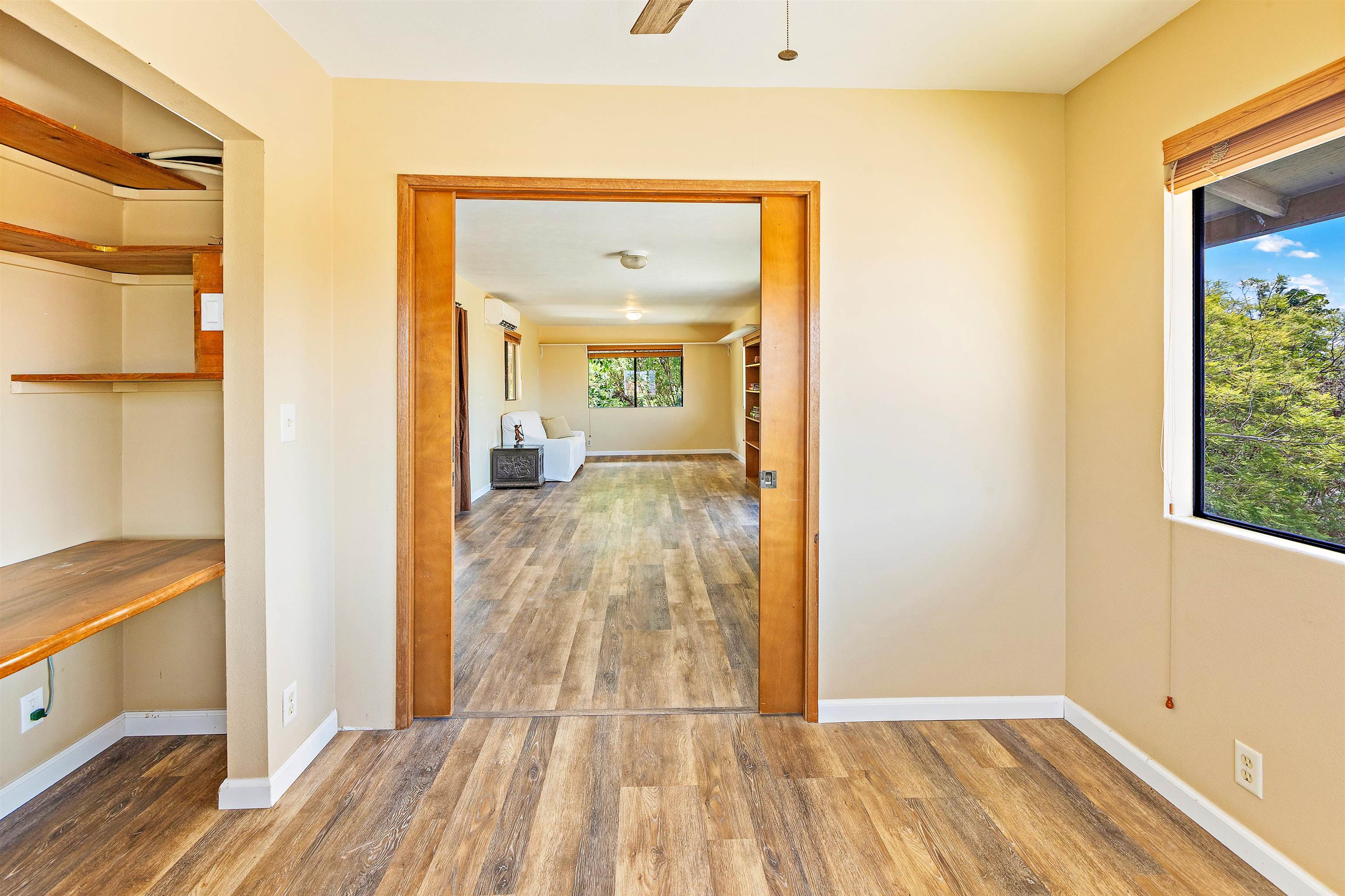 31 Pualu Loop Lahaina, HI 96761 - Photo 27 of 40 a view of a room with wooden floor and a bathroom