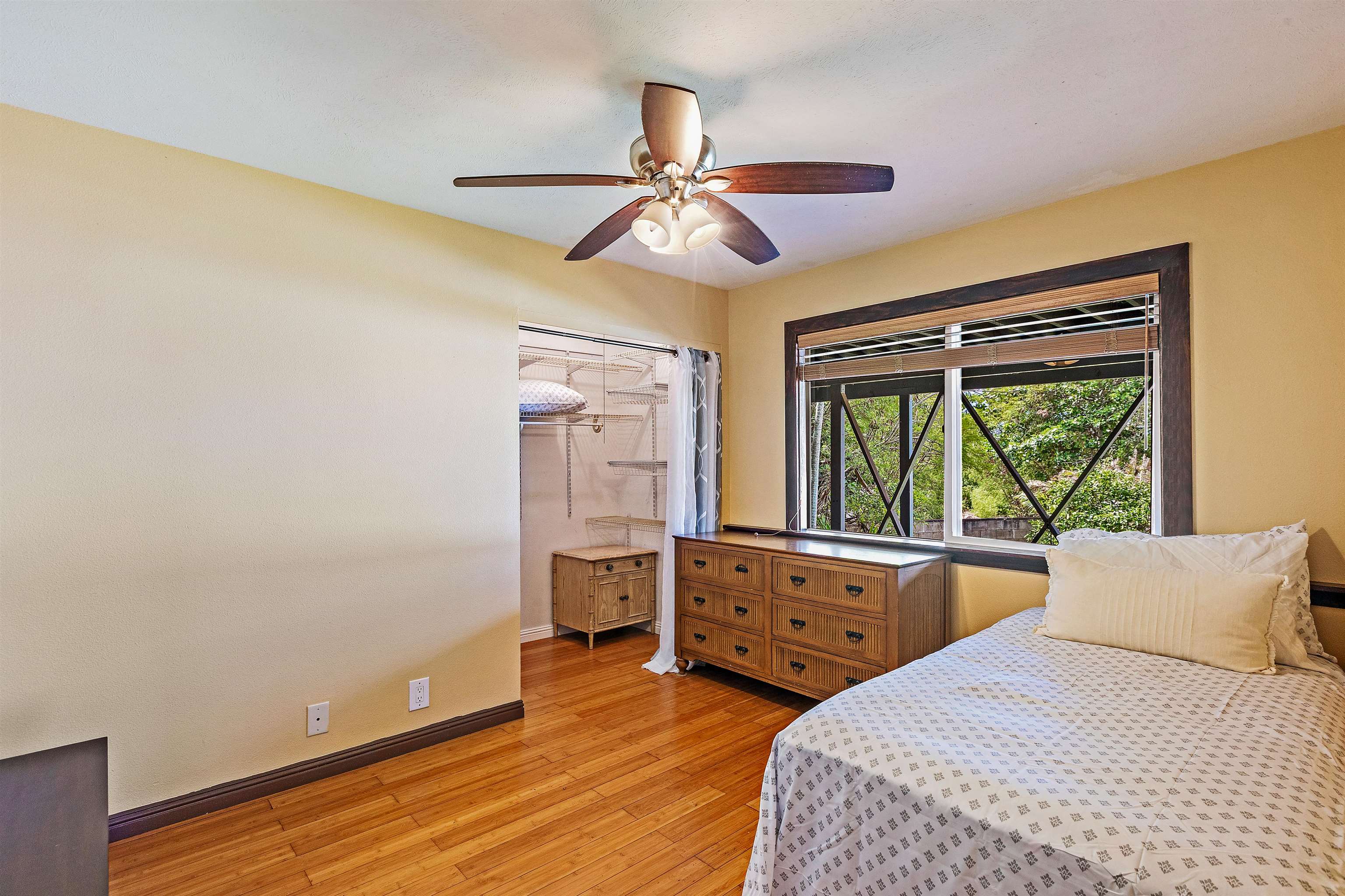 31 Pualu Loop Lahaina, HI 96761 - Photo 34 of 40 a bedroom with a bed and a window