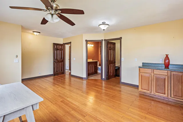 a view of an empty room and window