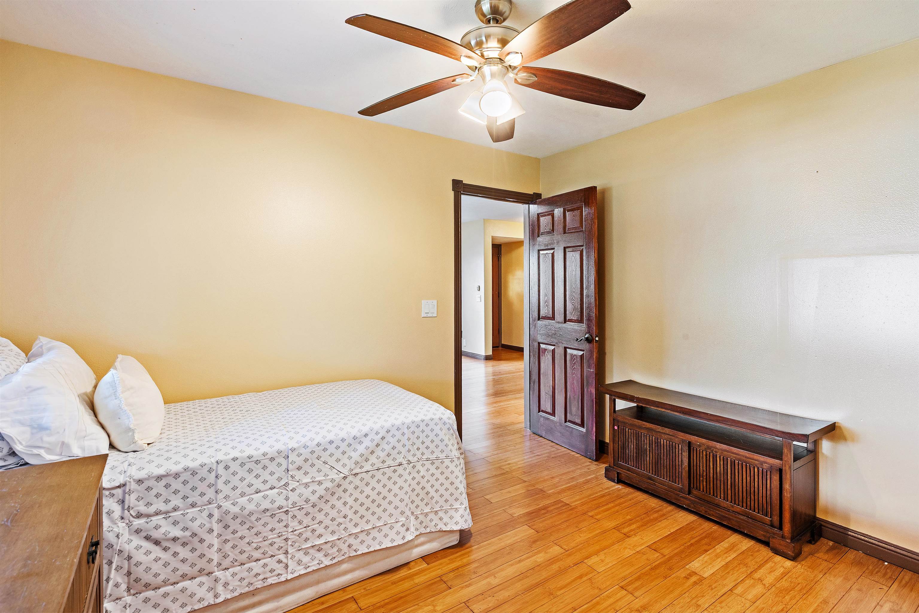 31 Pualu Loop Lahaina, HI 96761 - Photo 38 of 40 a bedroom with a bed dresser and a window