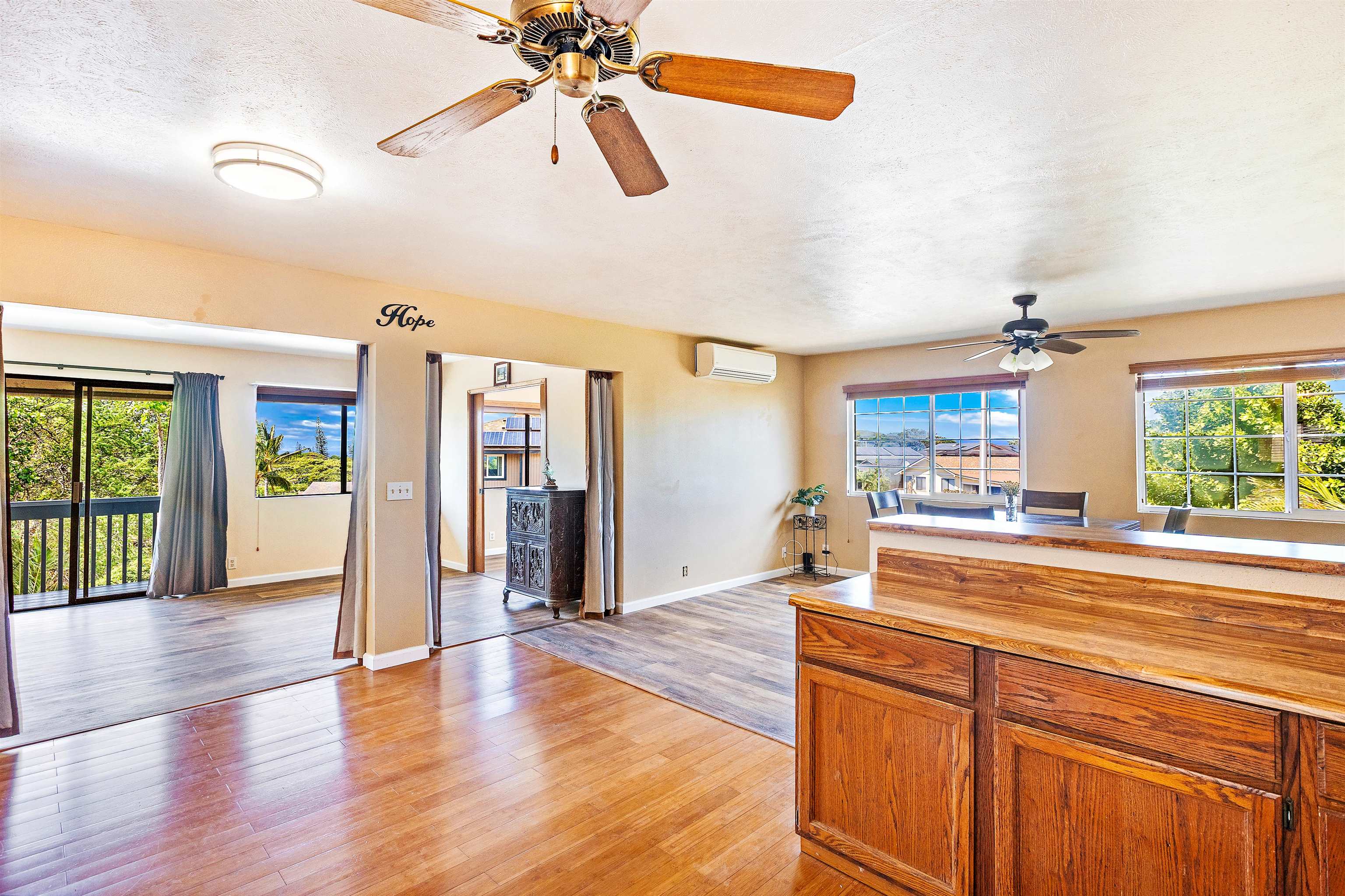 31 Pualu Loop Lahaina, HI 96761 - Photo 8 of 40 wooden floor in an empty room with a window