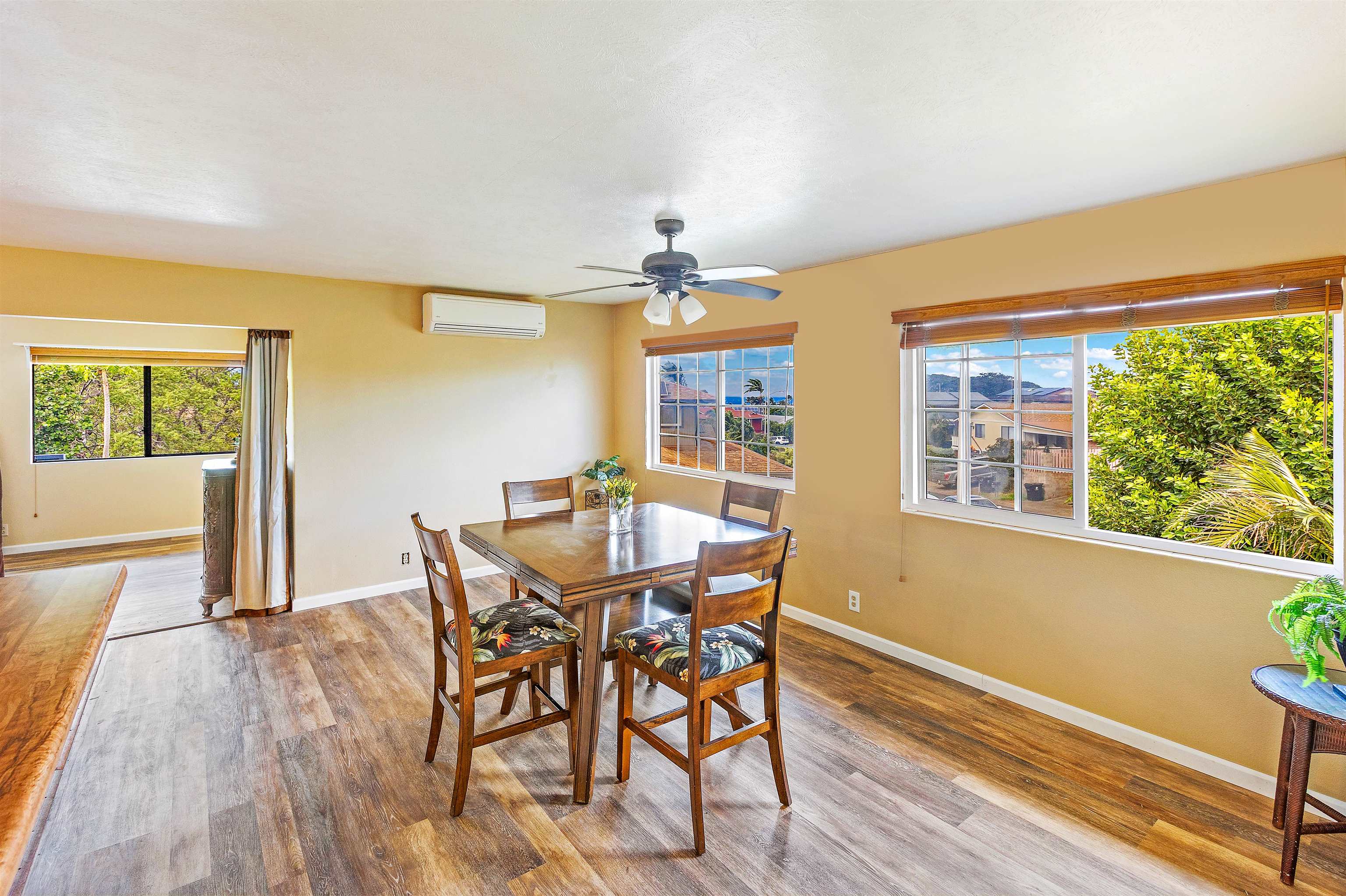 31 Pualu Loop Lahaina, HI 96761 - Photo 9 of 40 a view of a dining room with furniture and wooden floor