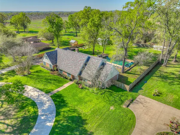an aerial view of a house with garden