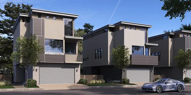 a front view of a house with garage