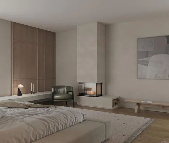 a bedroom with a bed and a lamp