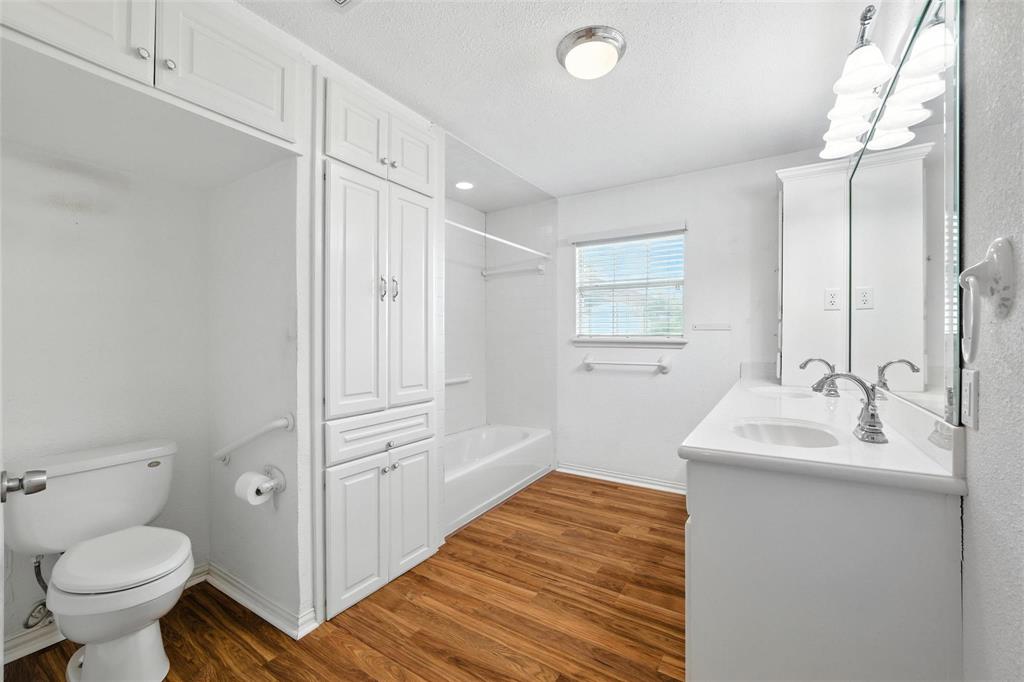 358 Wright Road Waxahachie, TX 75167 - Photo 29 of 38 a bathroom with a sink toilet and vanity