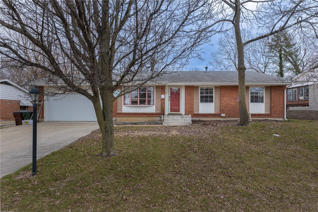 6300 Carnation Road Dayton, OH 45449 - Photo 1 of 35 This cozy home offers classic brick construction and a convenient attached garage.