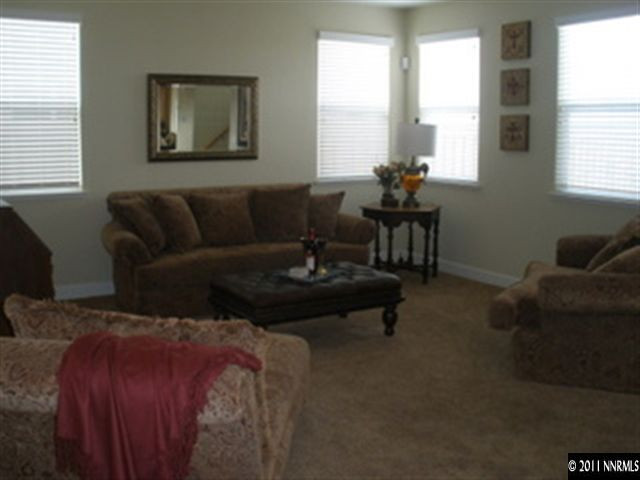 525 Terracina Way Reno, NV 89521 - Photo 6 of 13 a living room with furniture and a window