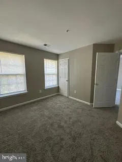 a bathroom with a double vanity sink mirror double and shower