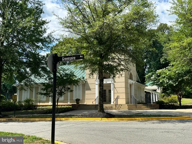 a view of street with houses