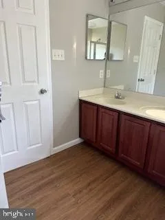 a bathroom with a toilet and a sink