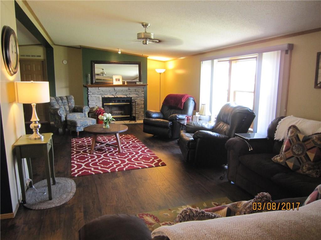 113 Braddock Road Smithfield, PA 15478 - Photo 11 of 24 FAMILY ROOM- NEW WOOD FLOOR AND FRESH PAINT!
