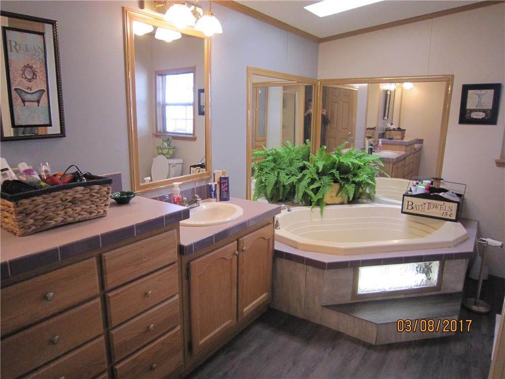 113 Braddock Road Smithfield, PA 15478 - Photo 15 of 24 MASTER BATH-NEW WOOD FLOOR