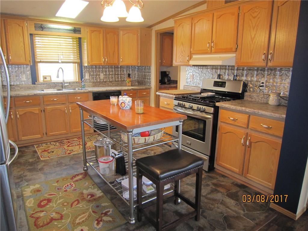 113 Braddock Road Smithfield, PA 15478 - Photo 7 of 24 KITCHEN-NEW COUNTER TOPS AND BACKSPLASH