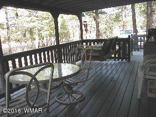 2876 Markham Road Overgaard, AZ 85933 - Photo 27 of 30 a view of a balcony with furniture