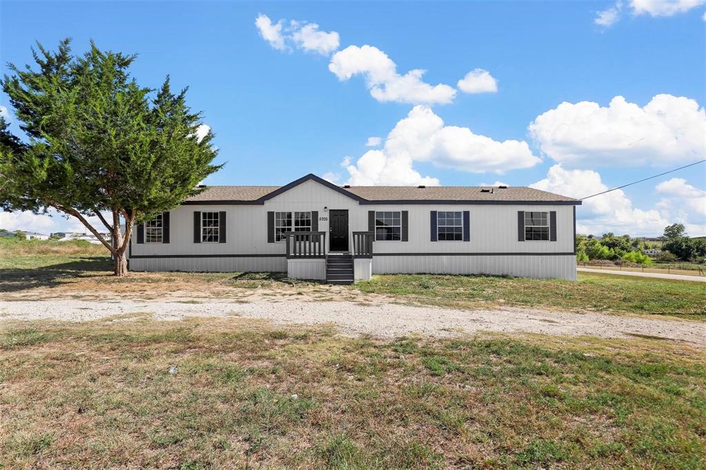 5705 Texas Street Joshua, TX 76058 - Photo 1 of 29 Manufactured / mobile home featuring a front yard