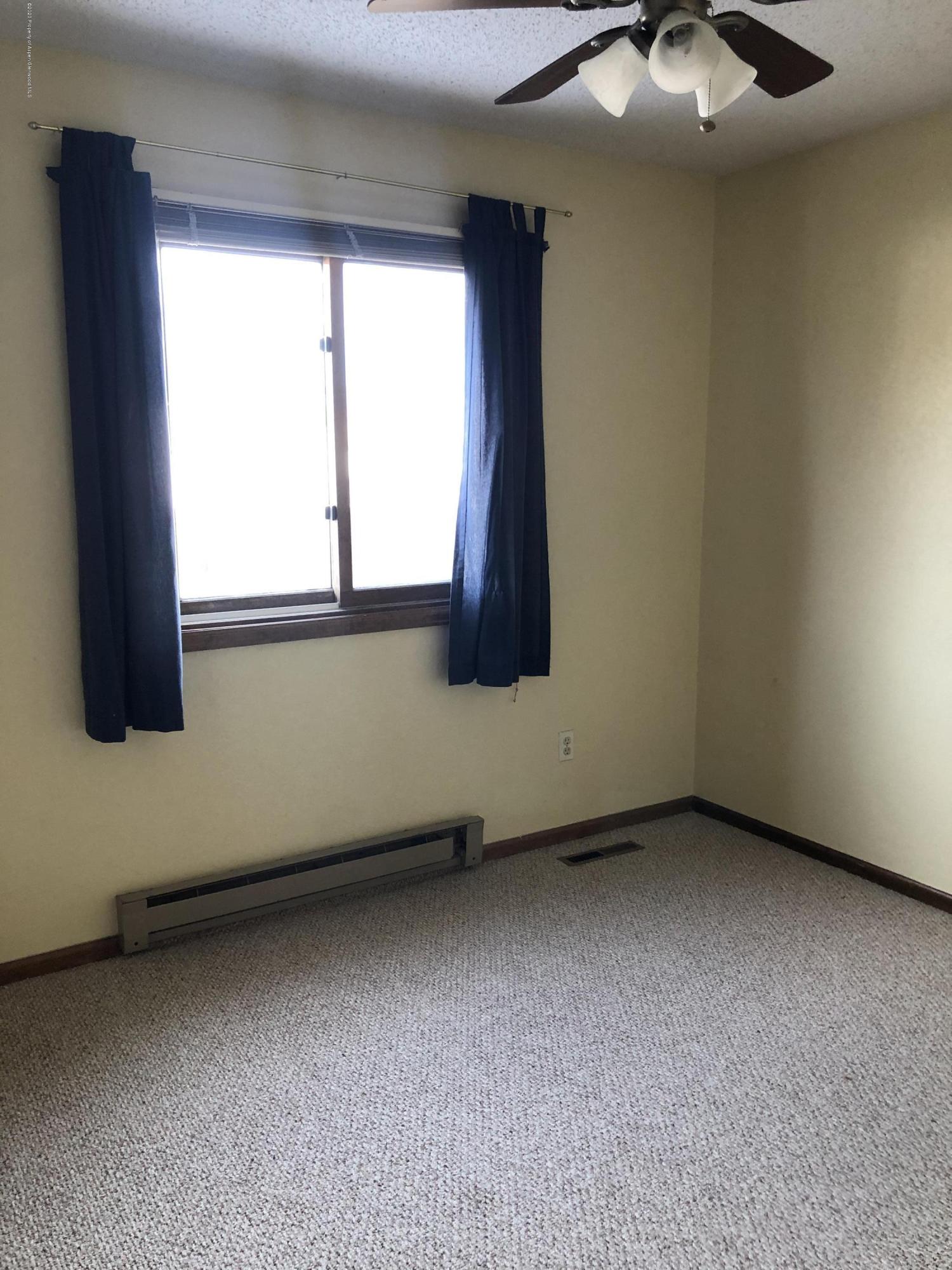 620 Elm Court Rifle, CO 81650 - Photo 9 of 16 an empty room with a window