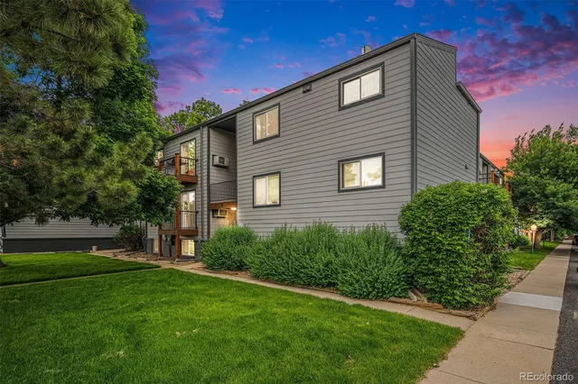 a brick house with a large windows