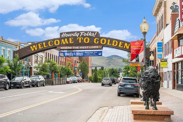 a view of a city street with a building