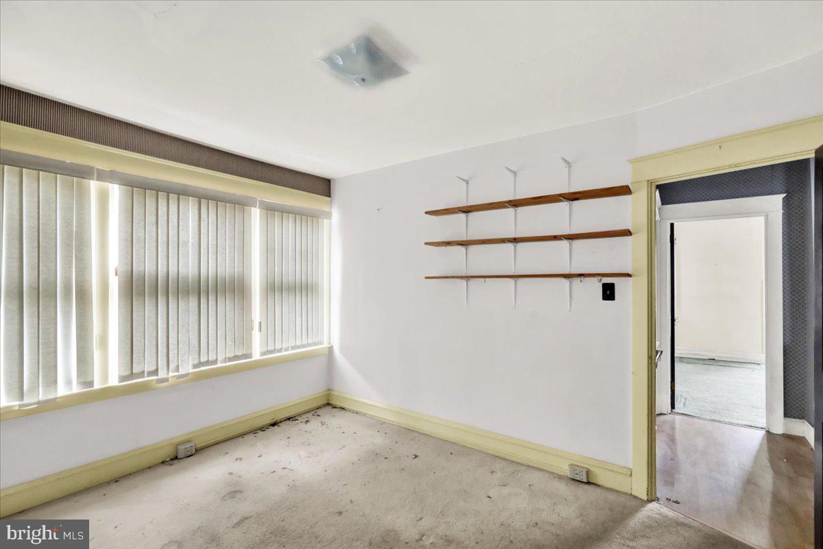 1525 North 14th Street Reading, PA 19604 - Photo 18 of 28 a view of an empty room with a window