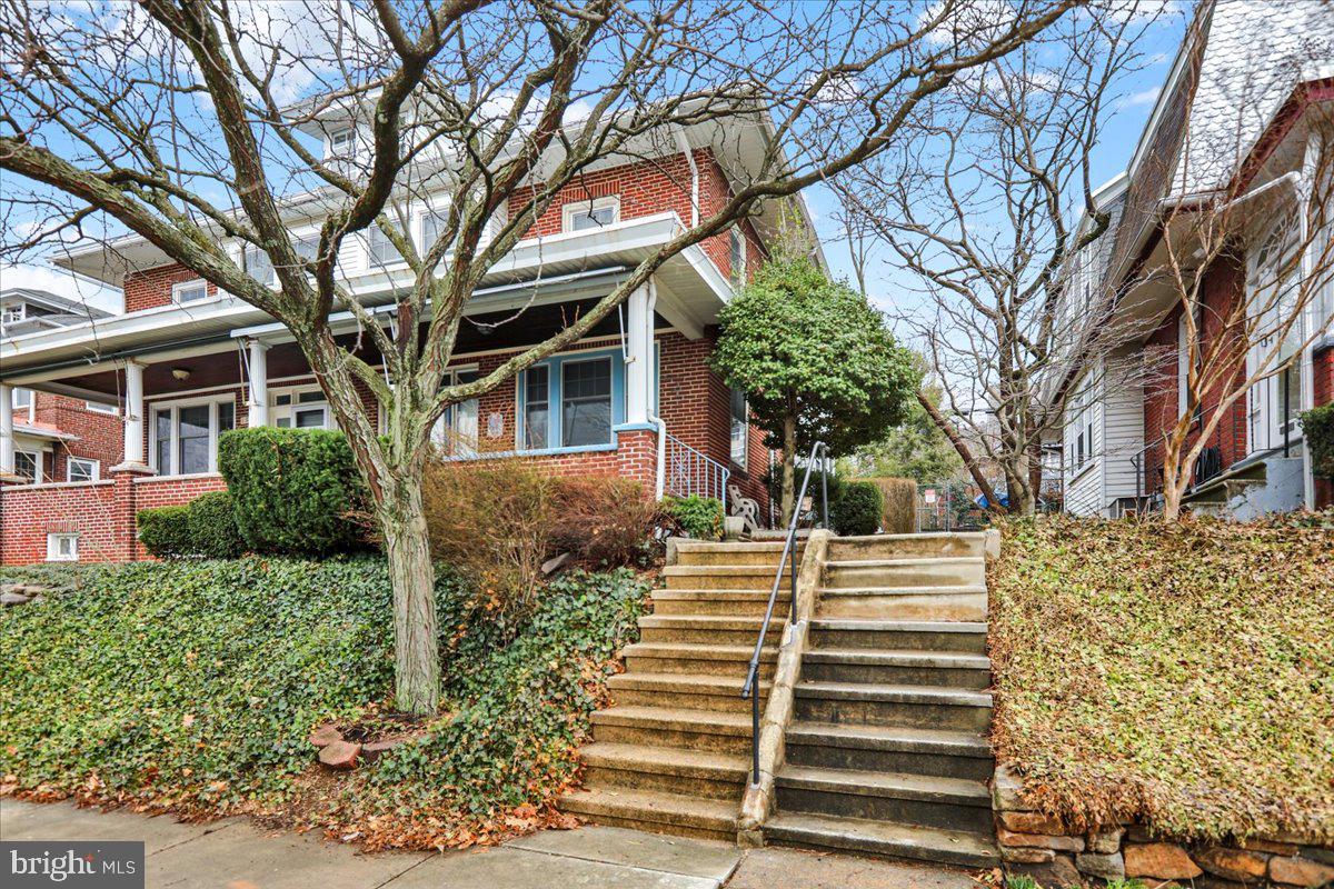 1525 North 14th Street Reading, PA 19604 - Photo 2 of 28 a front view of a house with a yard
