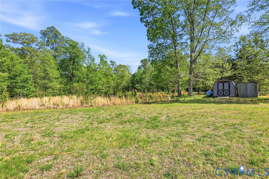 5816 Abilene Road Farmville, VA 23901 - Photo 4 of 26 a front view of a house with a yard