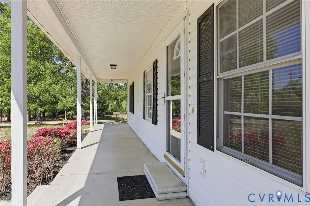 5816 Abilene Road Farmville, VA 23901 - Photo 5 of 26 a view of a balcony with chair