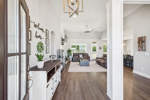 a view of a living room and dining room