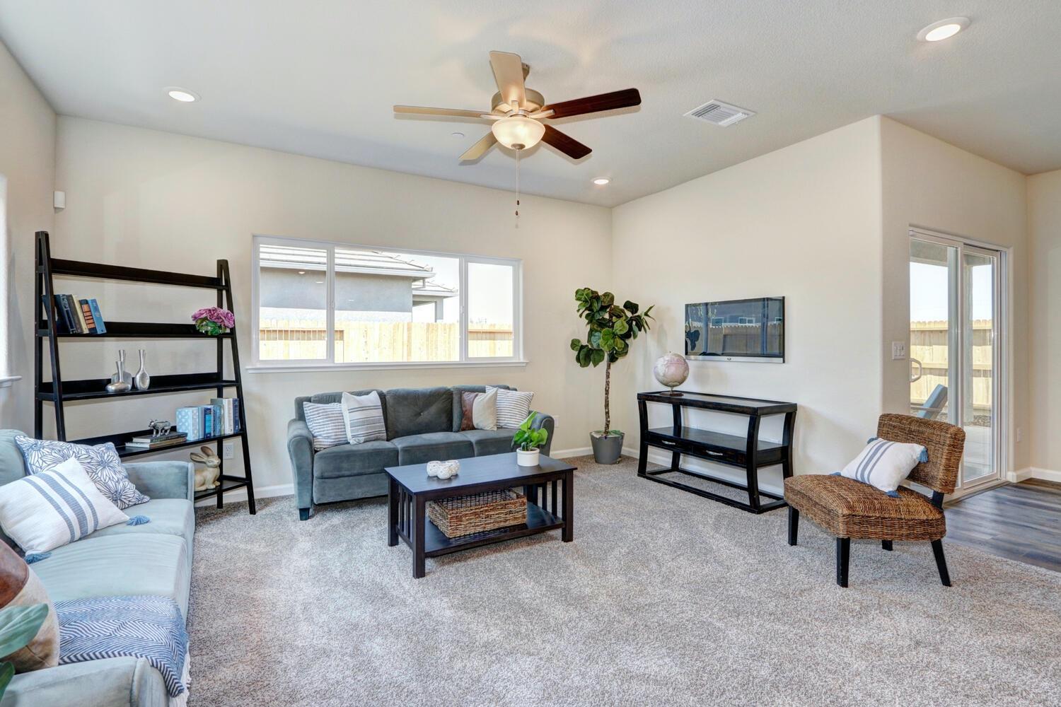 1071 Hogan Road Galt, CA 95632 - Photo 9 of 17 a living room with furniture and a window