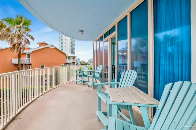 a balcony view with a garden space