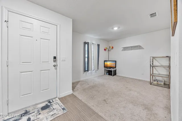 a room with furniture and a window