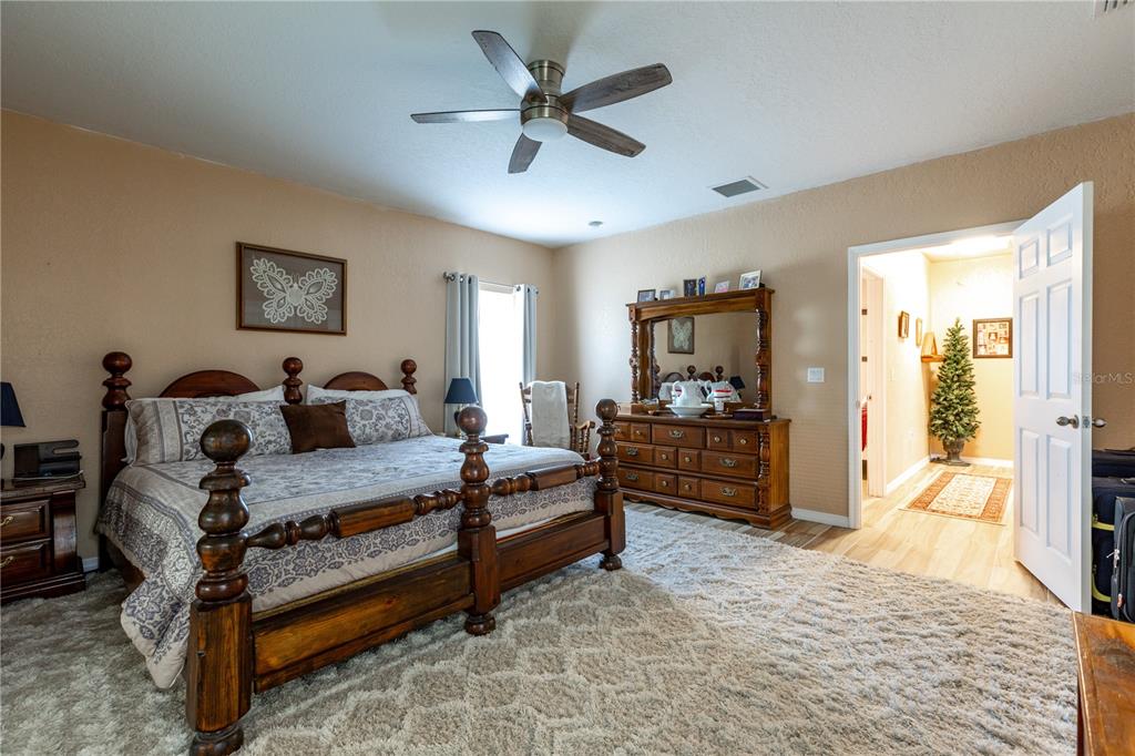 402 Southeast 709th Street Old Town, FL 32680 - Photo 16 of 37 a living room with furniture and a wooden floor