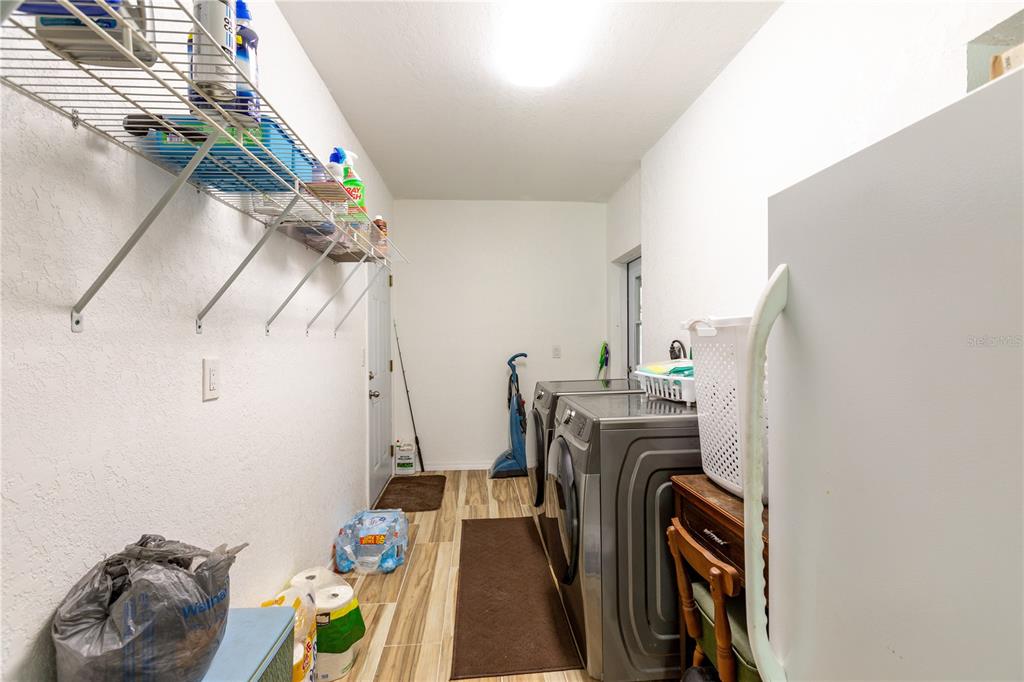 402 Southeast 709th Street Old Town, FL 32680 - Photo 24 of 37 a utility room with dryer and washer