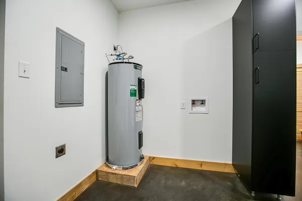 a bedroom with a bed and a ceiling fan