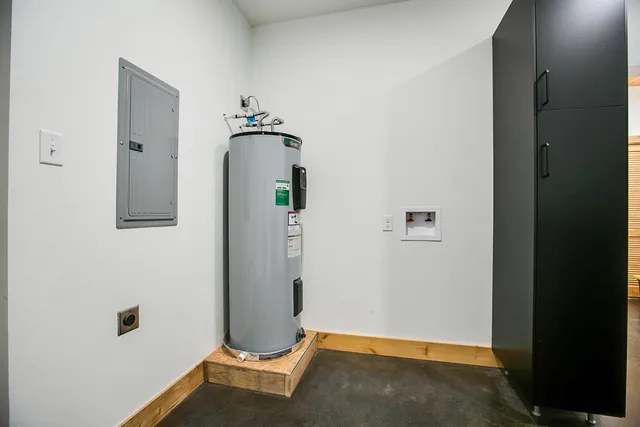 a bedroom with a bed and a ceiling fan