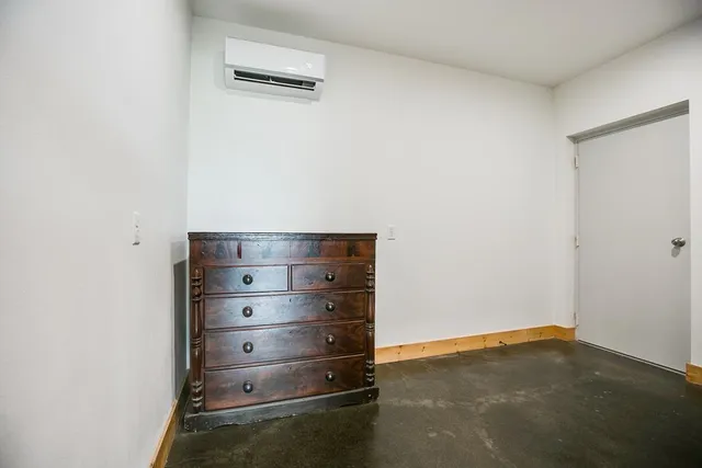 a view of bathroom with a sink toilet and mirror