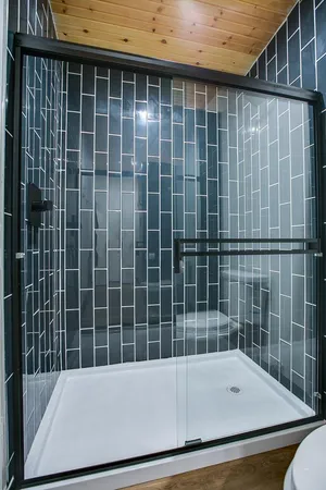 a bathroom with a sink toilet and mirror