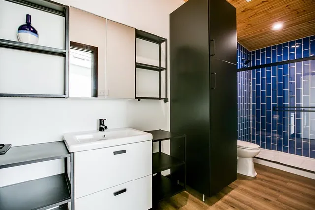 a view of a chairs and tables in a patio